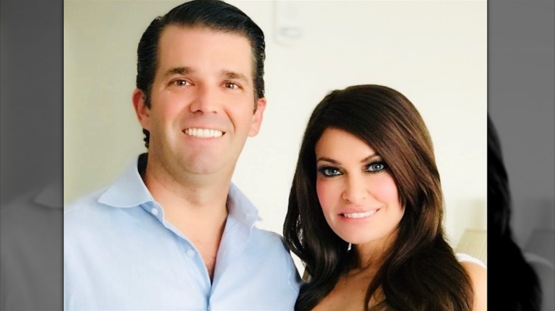 Kimberly Guilfoyle and Donald Trump Jr smiling