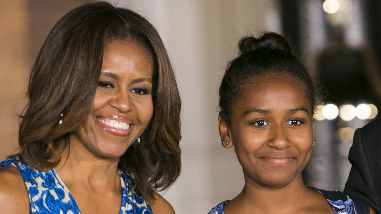 Michelle, Sasha Obama smiling