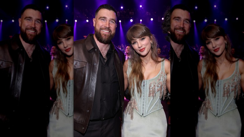 Travis Kelce and Taylor Swift posing at the iHeart Radio Awards