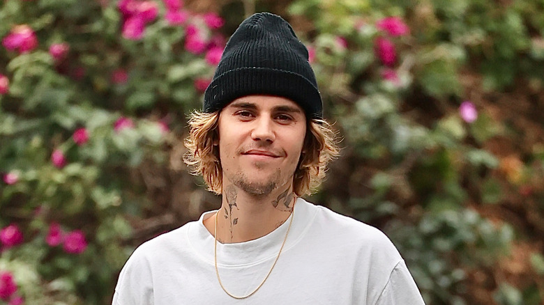 Justin Bieber black knit hat white t-shirt