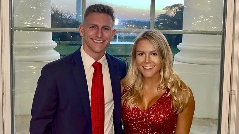 Karoline Leavitt smiling at the White House