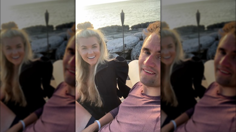 Erika and Charlie Kirk together at the beach.