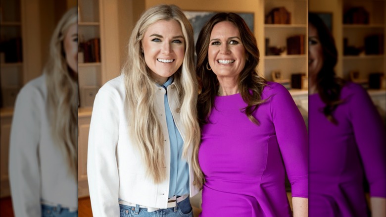 Erika Kirk standing with sarah huckabee sanders