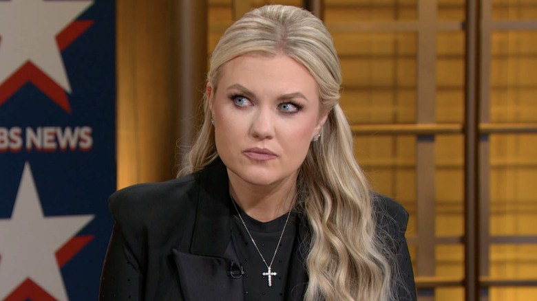 Erika Kirk looking to her right in black jacket