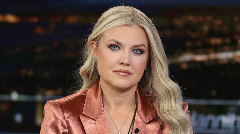 Erika Kirk wearing bronze jacket