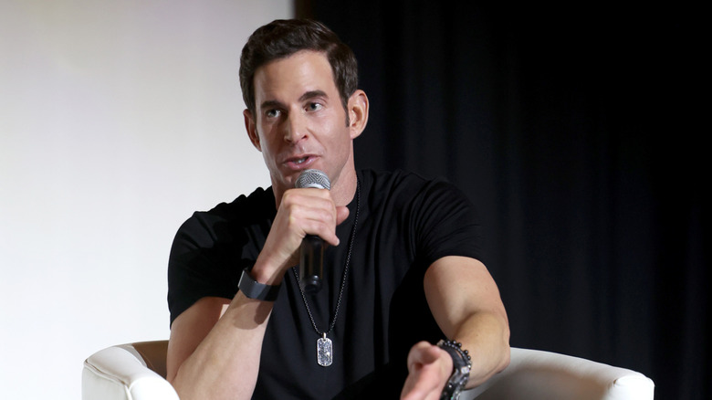 Tarek El Moussa sitting and speaking