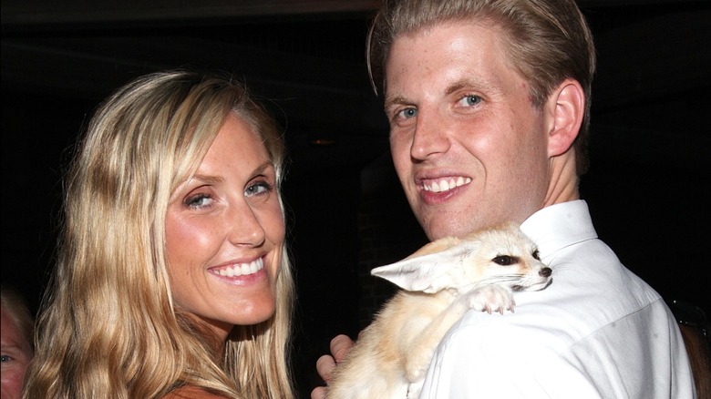 Lara Trump and Eric Trump holding a fox