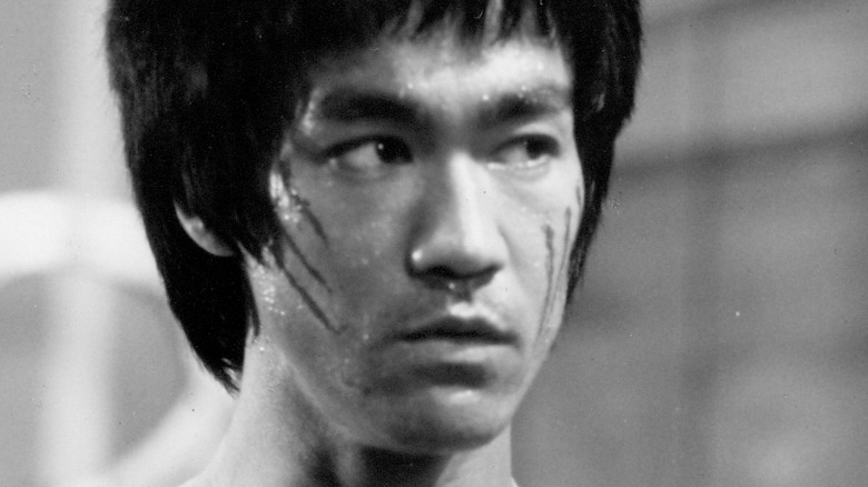 Bruce Lee looking away