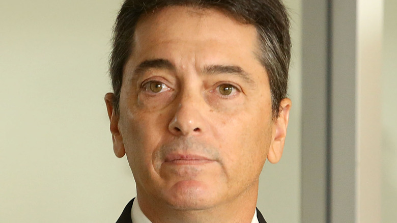 Scott Baio wearing a suit