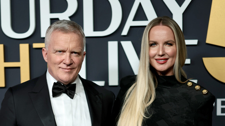 Anthony Michael Hall and Lucia Oskerova pose in 2025