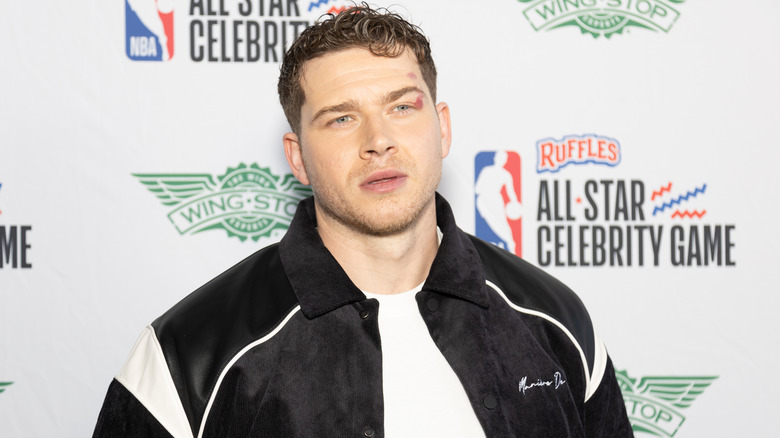 Oliver Stark poses ahead of the All-Star Celebrity NBA game.