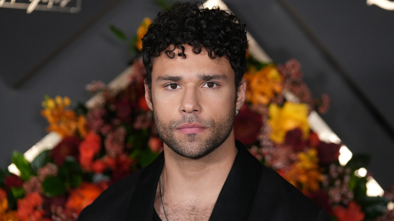Rafael Silva posing on the red carpet.