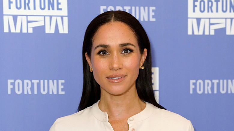 Meghan Markle poses for photos