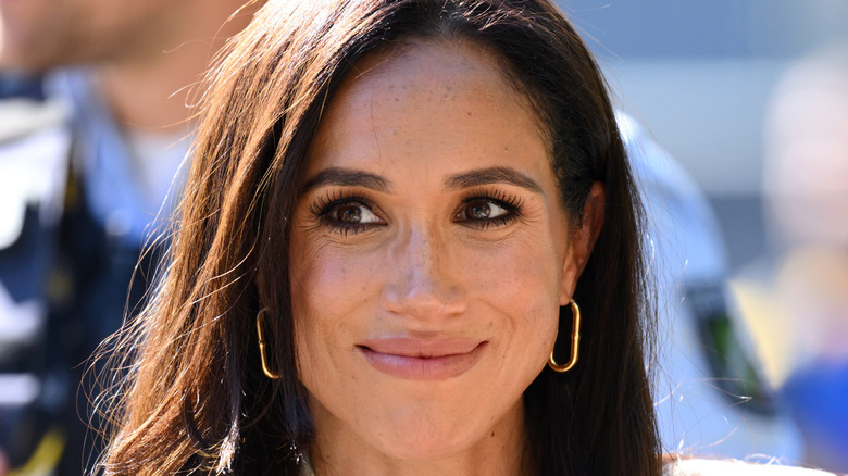 Meghan Markle smirking