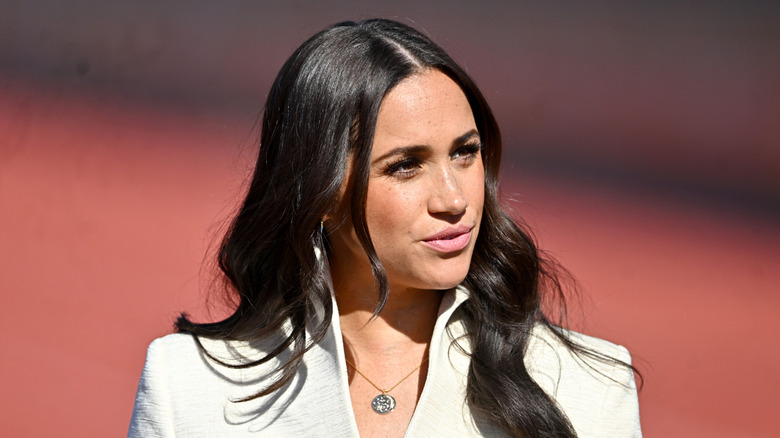 Meghan Markle looking to the side