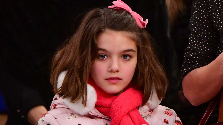 Suri Cruise standing