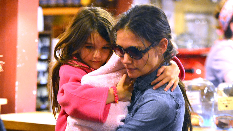 Katie Holmes hugging Suri Cruise