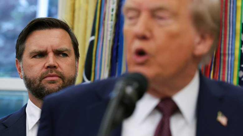 JD Vance stands behind Donald Trump at his September 2, 2025, press conference