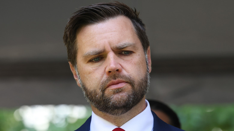 JD Vance frowning with dark eyes on September 11, 2024