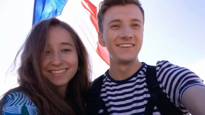 Alina Shaimardanova with Steven Johnston outside