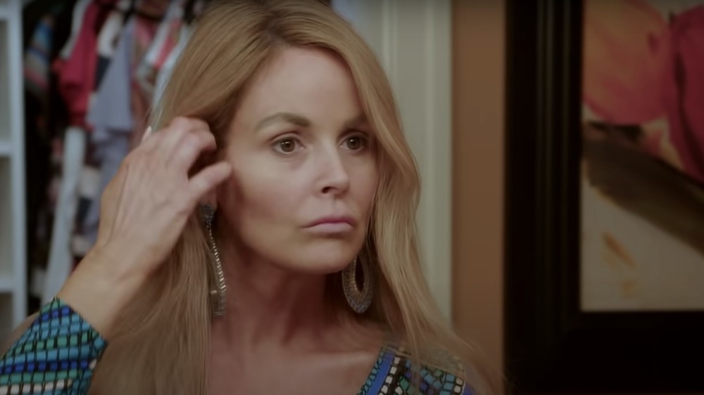 Stephanie Davison looking in a mirror