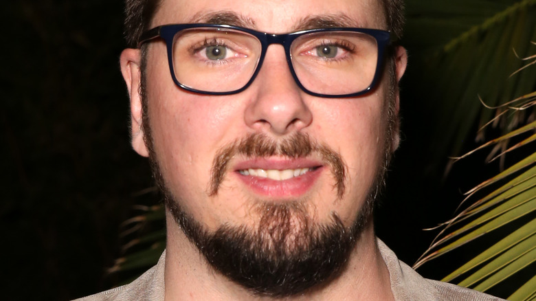 Colt Johnson smiles at an event