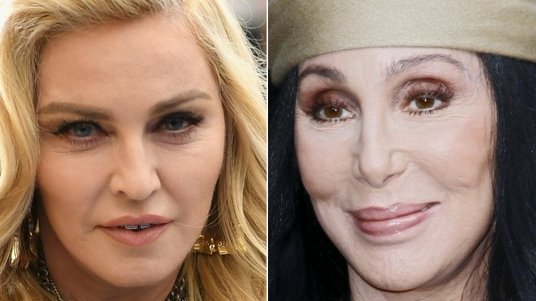 Madonna wearing diamond grills, Cher wearing a hat