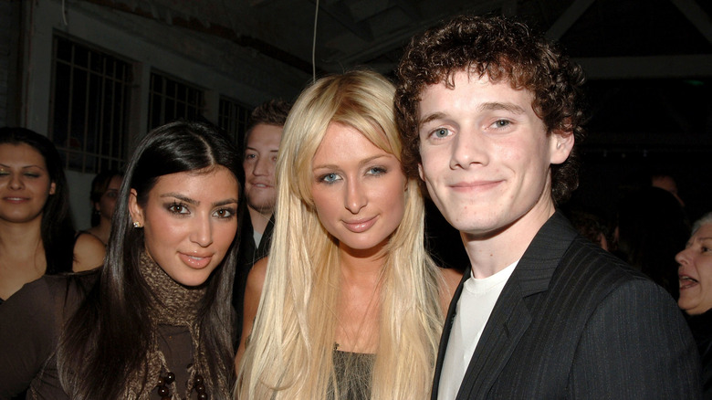 Kim Kardashian and Paris Hilton, both smiling