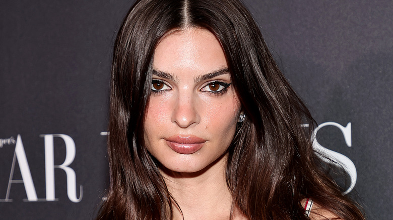 Emily Ratajkowski posing for photos