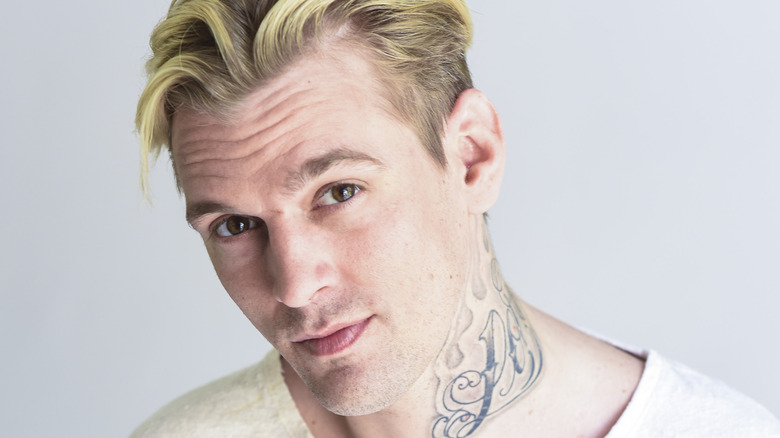 Aaron Carter wearing white