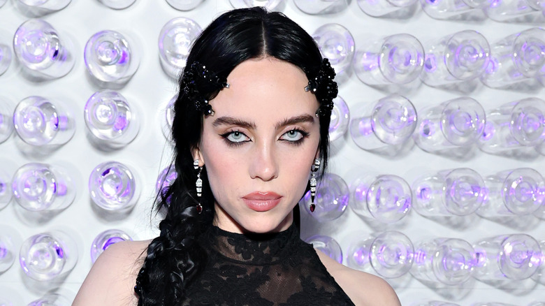 Billie Eilish poses in black
