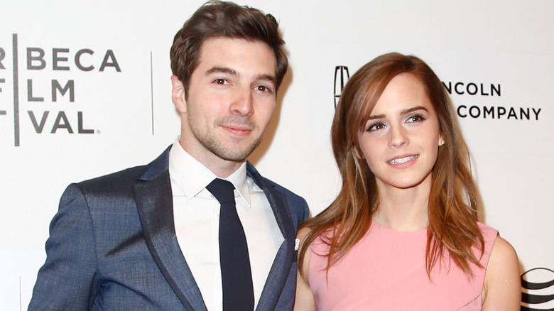 Roberto Aguire posing with Emma Watson