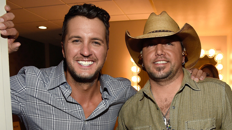 Luke Bryan and Jason Aldean smiling