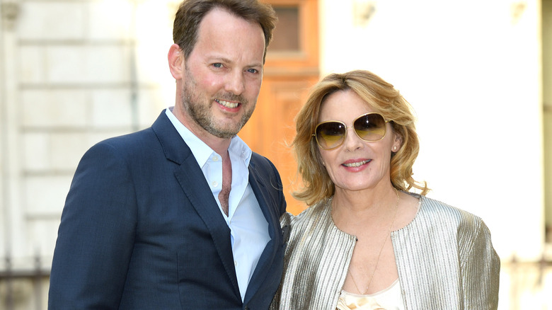 Russ Thomas and Kim Cattrall pose