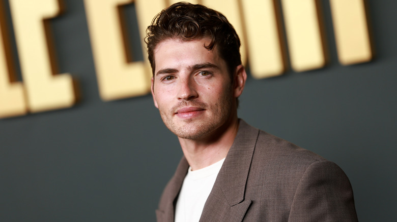 Gregg Sulkin on the red carpet.