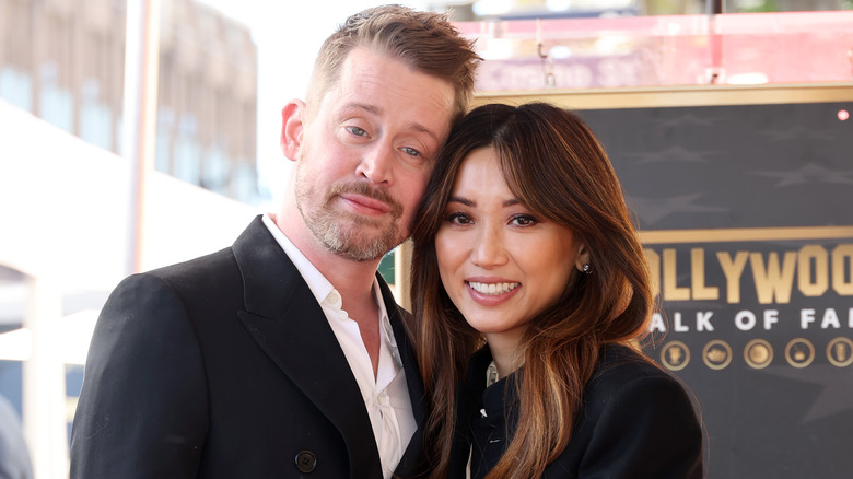 Macaulay Culkin and Brenda Song smiling