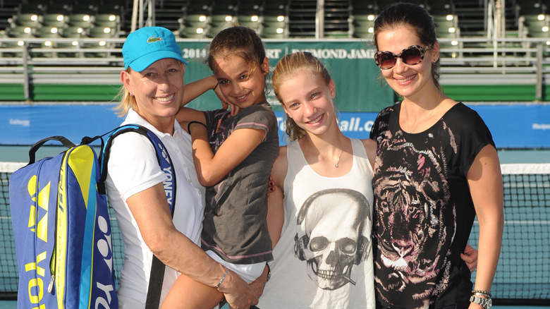 Martina Navratilova and Julia Lemigova with their daughters