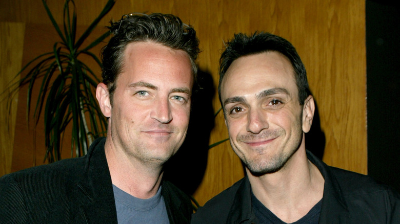 Matthew Perry and Hank Azaria smiling