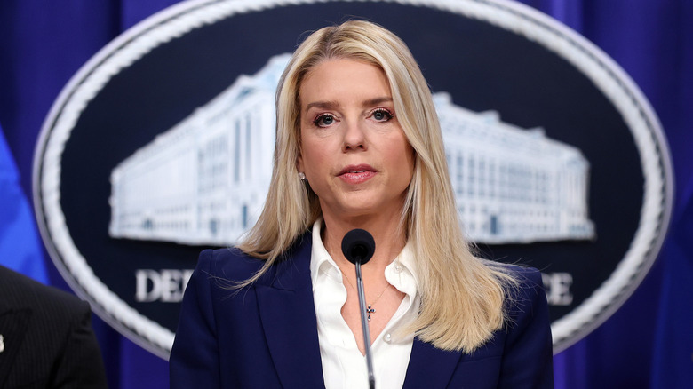 Attorney General Pam Bondi delivering remarks on an arrest connected to the 2012 U.S. Embassy attack in Benghazi, at the Department of Justice