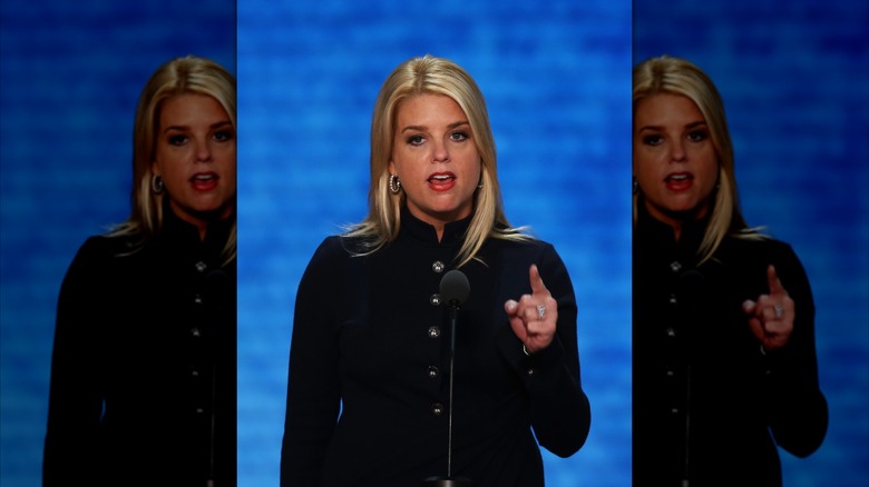 Florida Attorney General Pam Bondi wearing a button-up black coat and speaking during the third day of the Republican National Convention at the Tampa Bay Times Forum