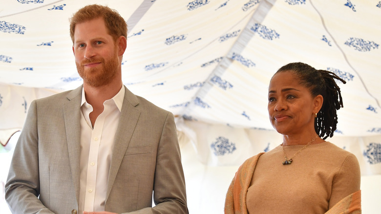 Prince Harry and mother-in-law Doria Ragland posing