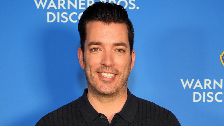 Jonathan Scott with scruff smiling