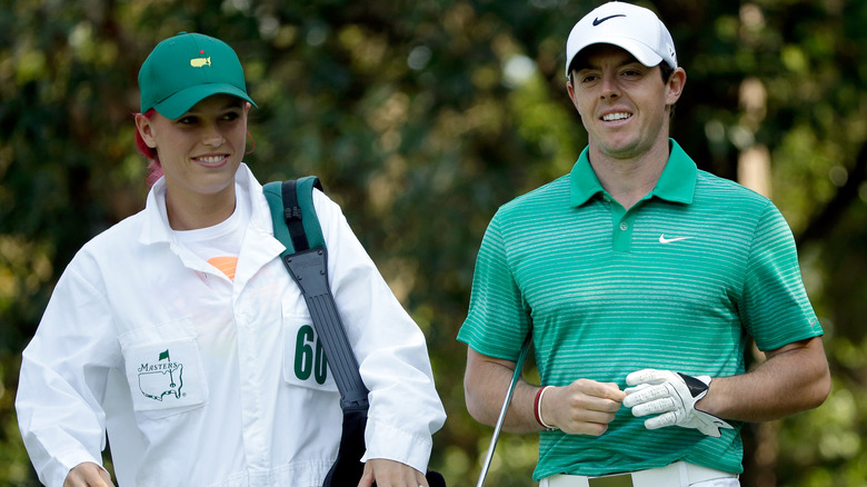 Caroline Wozniacki and Rory McIlroy smiling