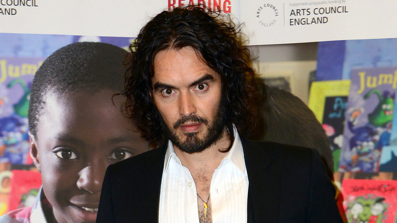 Russell Brand wearing a black blazer