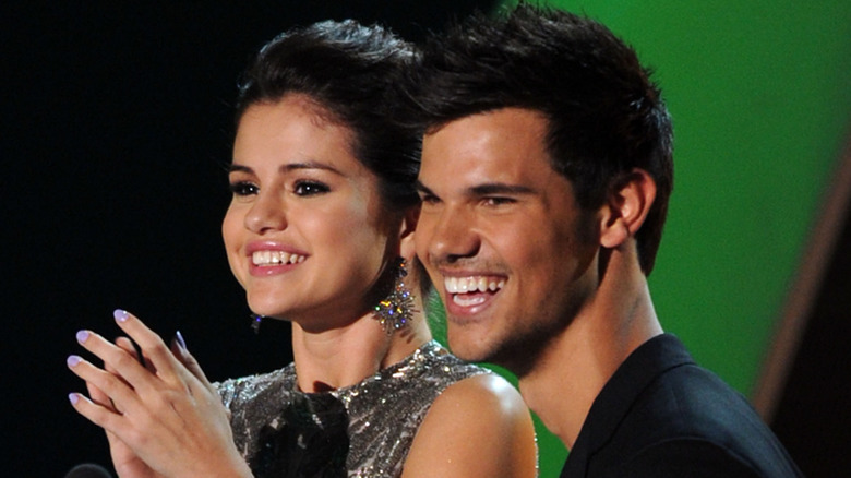 Selena Gomez and Taylor Lautner smiling
