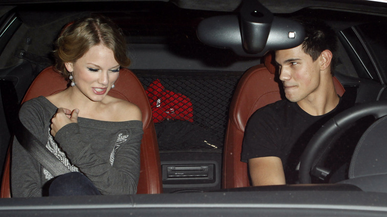 Taylor Swift and Taylor Lautner driving