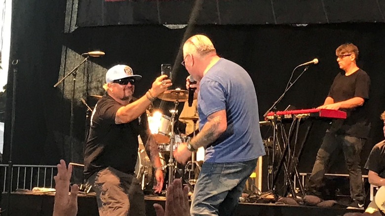 Guy Fieri and Steve Harwell onstage