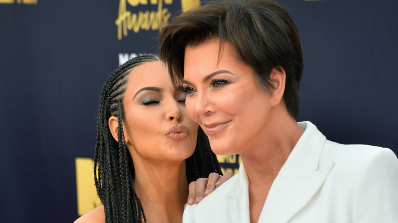Kris Jenner poses with daughter Kim