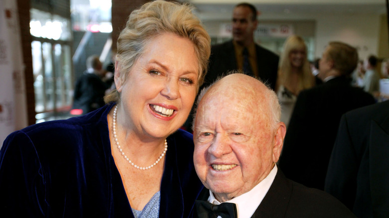 Mickey Rooney and Jan Chamberlin pose together at an event.