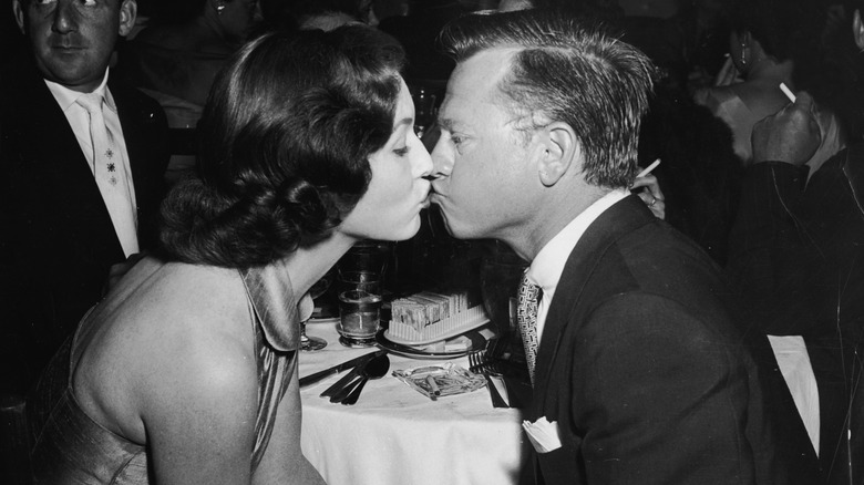 Mickey Rooney kissing his wife Elaine Mahnken.